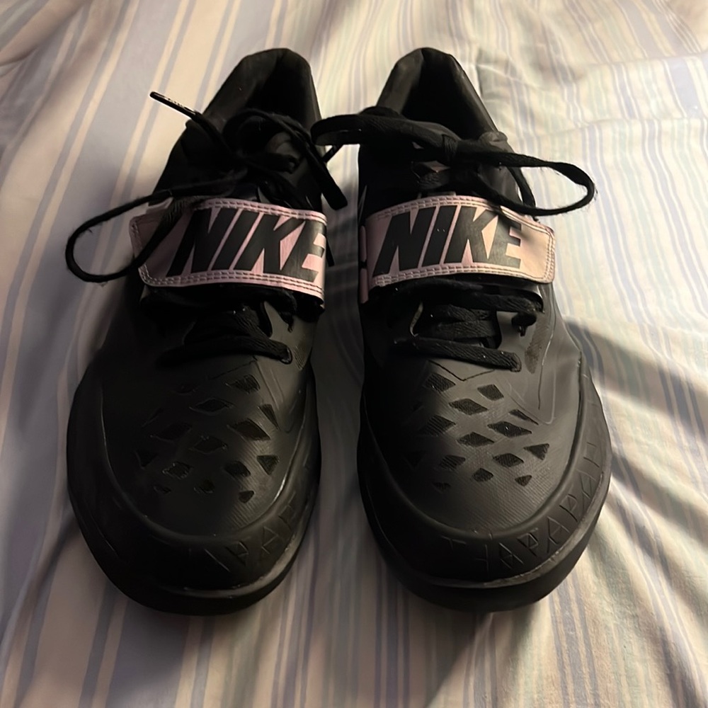 These shoes are throwing shoes for track and field. Shot put, discus throw.